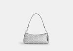 Coach Charlotte Shoulder Bag In Signature Canvas
